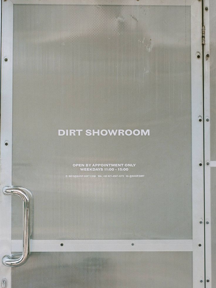 Showroom door, open by appointment